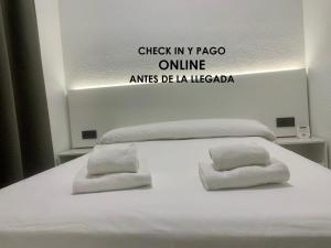 Postel nebo postele na pokoji v ubytování Hotel DL Urban