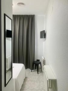 Postel nebo postele na pokoji v ubytování Hotel DL Urban