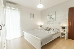Posteľ alebo postele v izbe v ubytovaní Villa Palanga + 36 fotografií