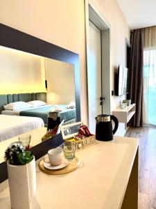 Hotel Umma客房内的一张或多张床位