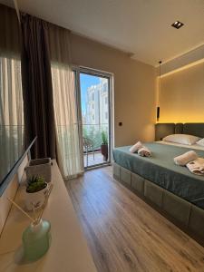 Hotel Umma客房内的一张或多张床位