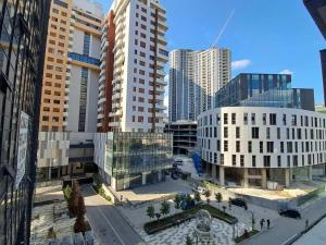 an aerial view of a city with tall buildings at 7 Studio Apartment in Pristina