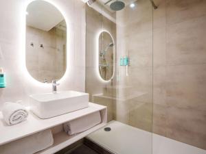 Koupelna v ubytování Novotel Saint Avold