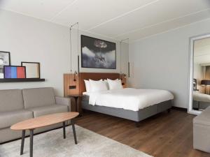 Postel nebo postele na pokoji v ubytování Radisson Blu Airport Hotel, Oslo Gardermoen