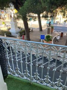 a fence in front of a park with a fire hydrant at Evasion Marine 1 in Palavas-les-Flots