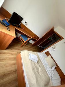 Katil atau katil-katil dalam bilik di Hotel Tisa Pohorje