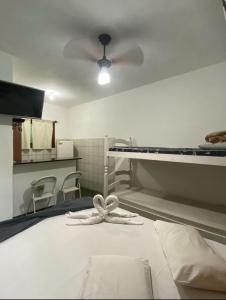 Cama ou camas em um quarto em Pousada Recanto das Tartarugas