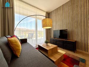 Et tv og/eller underholdning på Pod Brzozami Apartamenty Ku Morzu