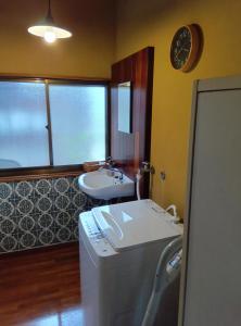 Koupelna v ubytování 駅前宿舎 禪 shared house zen