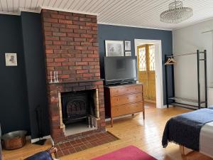 Postel nebo postele na pokoji v ubytování Ebbetorps Gård