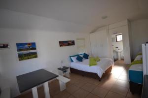 Postel nebo postele na pokoji v ubytování George Resort