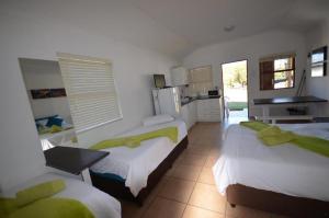 Postel nebo postele na pokoji v ubytování George Resort + 27 fotografií