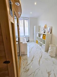 Φωτογραφία από το άλμπουμ του Ô Sacrée Détente de Reims -Spa privatif - Proche de la gare & centre ville σε Ρενς