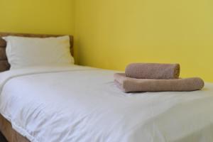 Ένα ή περισσότερα κρεβάτια σε δωμάτιο στο Apartmani Ad fines