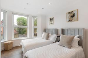 Postel nebo postele na pokoji v ubytování City Centre Maison