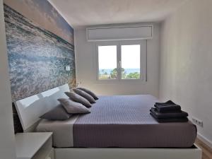 Postel nebo postele na pokoji v ubytování Apartamento a 100 metros de la playa