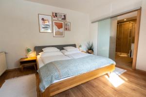 Postel nebo postele na pokoji v ubytování Dorfapartment Achensee