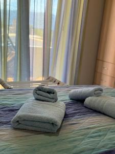 A bed or beds in a room at Vias