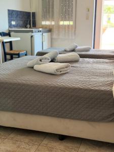 A bed or beds in a room at Vias