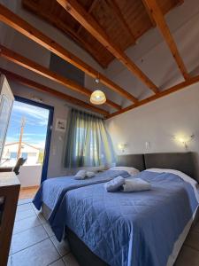 A bed or beds in a room at Vias