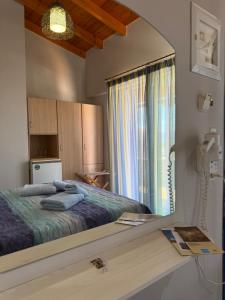 A bed or beds in a room at Vias