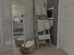 a room with a towel rack and a mirror at Guesthouse in Kärdla in Kärdla