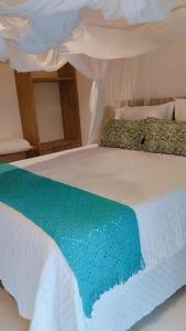 Postel nebo postele na pokoji v ubytování Casa Gabriela-Confort and Exclusivity in Trancoso + 17 fotografií