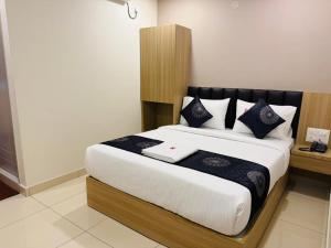 Postel nebo postele na pokoji v ubytování Hotel Sahara Express