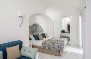 Postel nebo postele na pokoji v ubytování Hotel Onda Verde