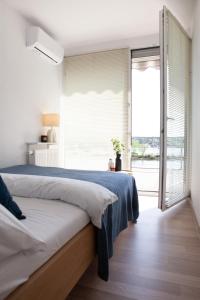 Posteľ alebo postele v izbe v ubytovaní Apartament Słoneczny Gródek 30 + 30 fotografií