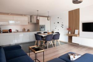 Kuchyňa alebo kuchynka v ubytovaní Apartament Słoneczny Gródek 30
