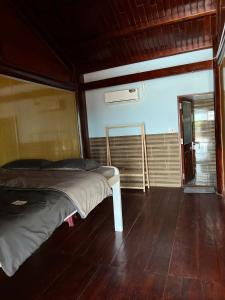 Postel nebo postele na pokoji v ubytování Amour House