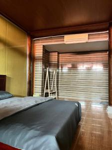 Postel nebo postele na pokoji v ubytování Amour House