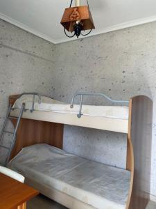 a bedroom with two bunk beds in a room at Maira House in Platamonas