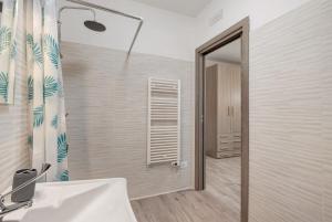 a bathroom with a shower and a sink and a mirror at Bnb anima in Cervere +52 photos