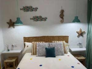 Postel nebo postele na pokoji v ubytování Villa Valentina + 8 fotografií