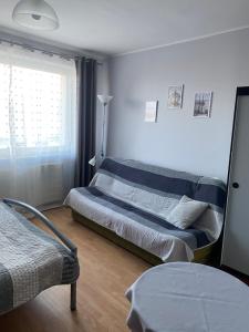 Postel nebo postele na pokoji v ubytování ADA - pokoje gościnne