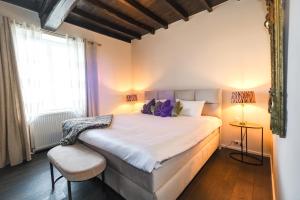 Ένα ή περισσότερα κρεβάτια σε δωμάτιο στο Villa Thun - Piscine - Maison de caractère au milieu des vignes +47 φωτογραφίες