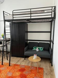 Postel nebo postele na pokoji v ubytování Pullman Apartman