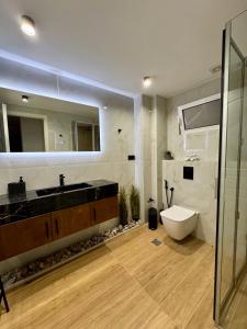Koupelna v ubytování Olivae Mare Suites