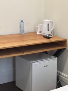 Η κουζίνα ή μικρή κουζίνα στο Apartman V Dedinje +9 φωτογραφίες