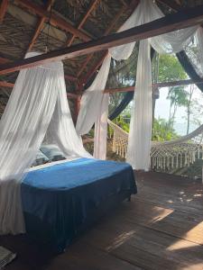 Ένα ή περισσότερα κρεβάτια σε δωμάτιο στο HostelyGlampingNativo