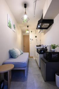 Χώρος καθιστικού στο 4min Shinjuku by sub Cozy Mini Room