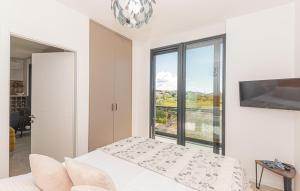 Postel nebo postele na pokoji v ubytování Murter - Jezera Luxury Apartments + 31 fotografií