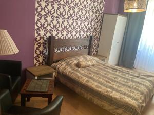 Łóżko lub łóżka w pokoju w obiekcie Leonia- Apartamenty i Pokoje Gościnne
