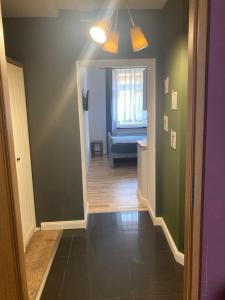 Łóżko lub łóżka w pokoju w obiekcie Leonia- Apartamenty i Pokoje Gościnne
