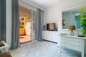 TV a/nebo společenská místnost v ubytování Panther Home Ipanema