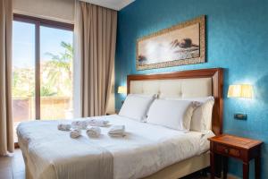 Voodi või voodid majutusasutuse Hotel Flora toas