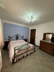 Postel nebo postele na pokoji v ubytování Appartamento Gallicano - La Tana