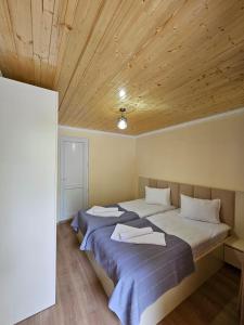Postel nebo postele na pokoji v ubytování Guest House Gulba